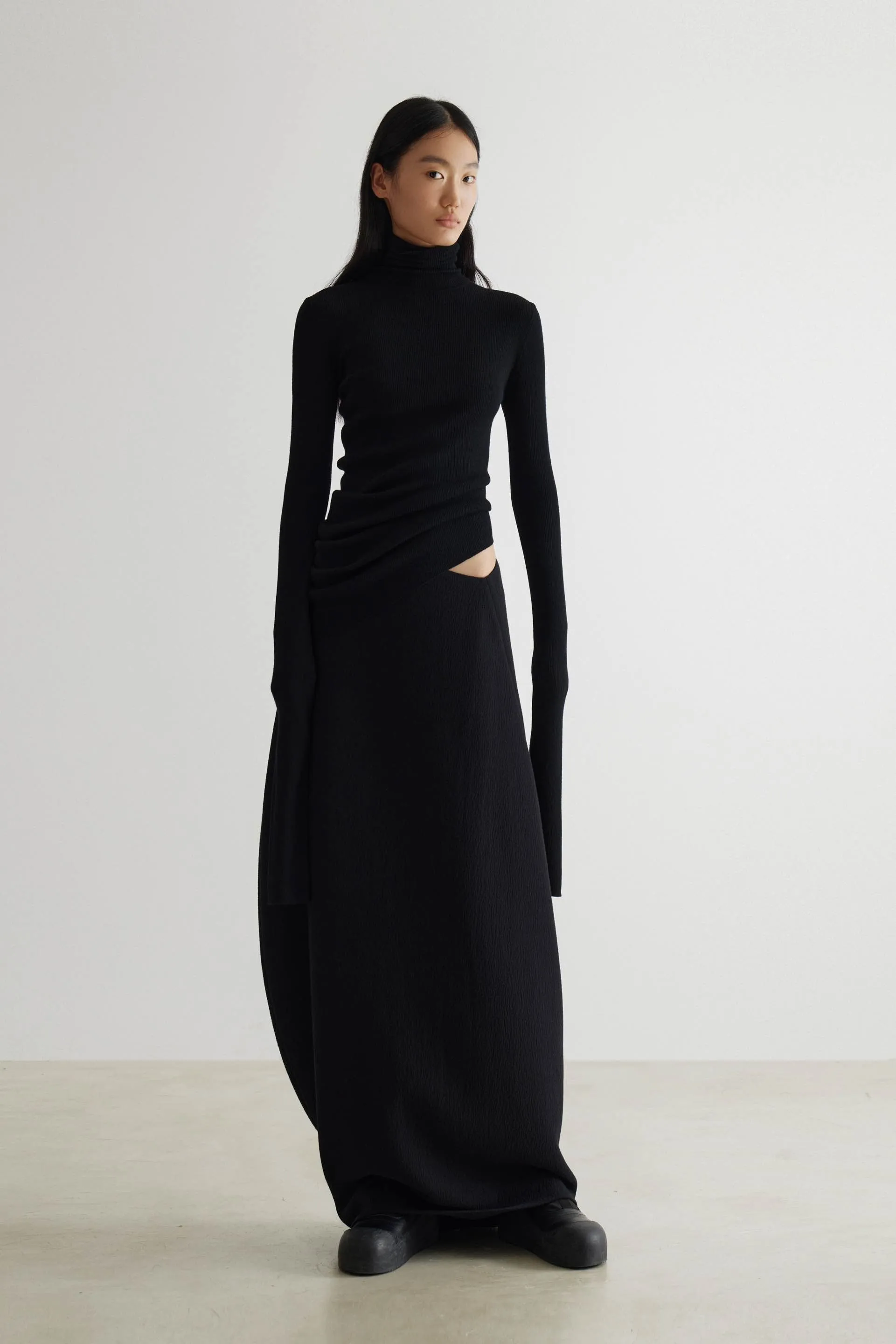 Geometric Curved Turtleneck Wool Knit Top