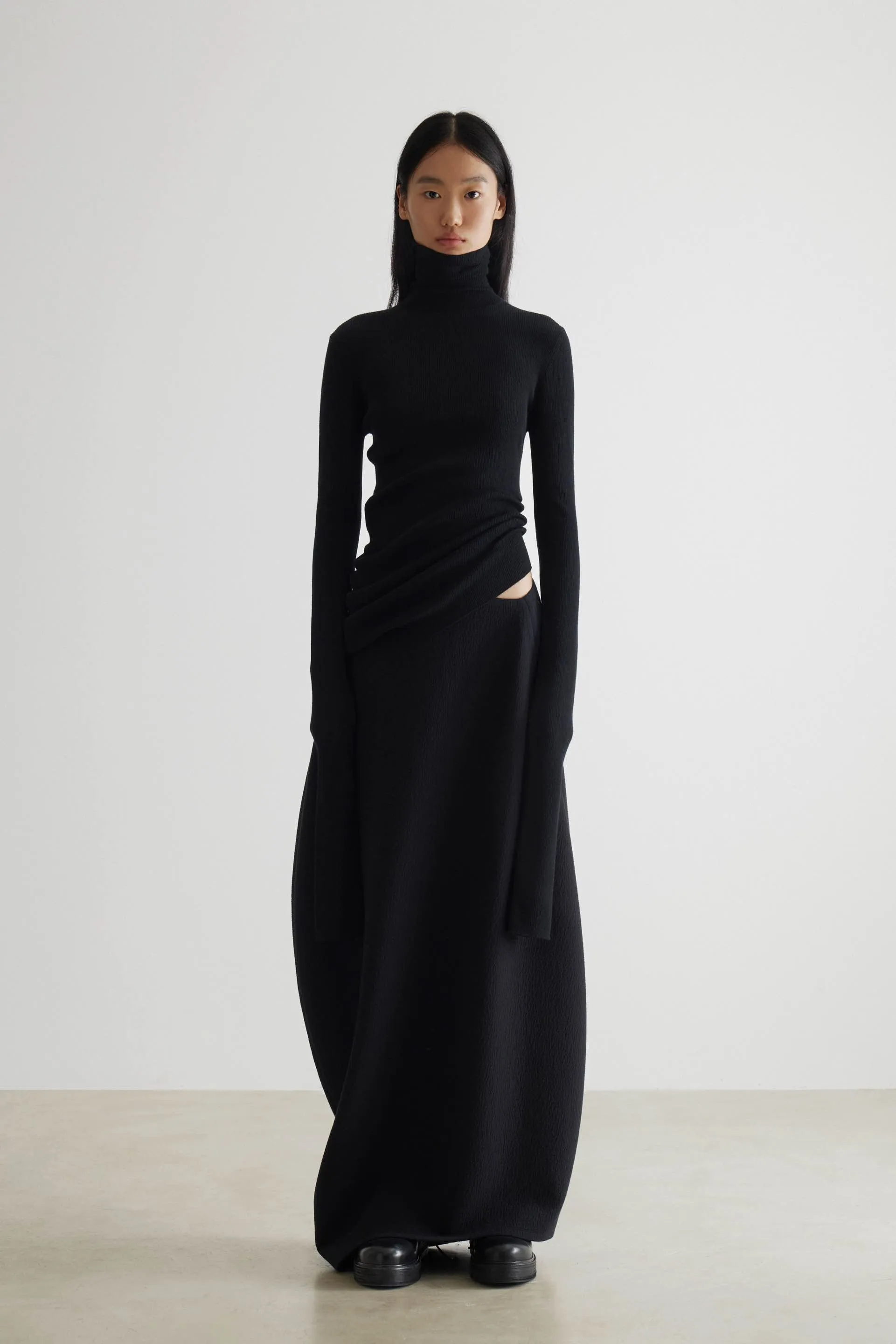 Geometric Curved Turtleneck Wool Knit Top