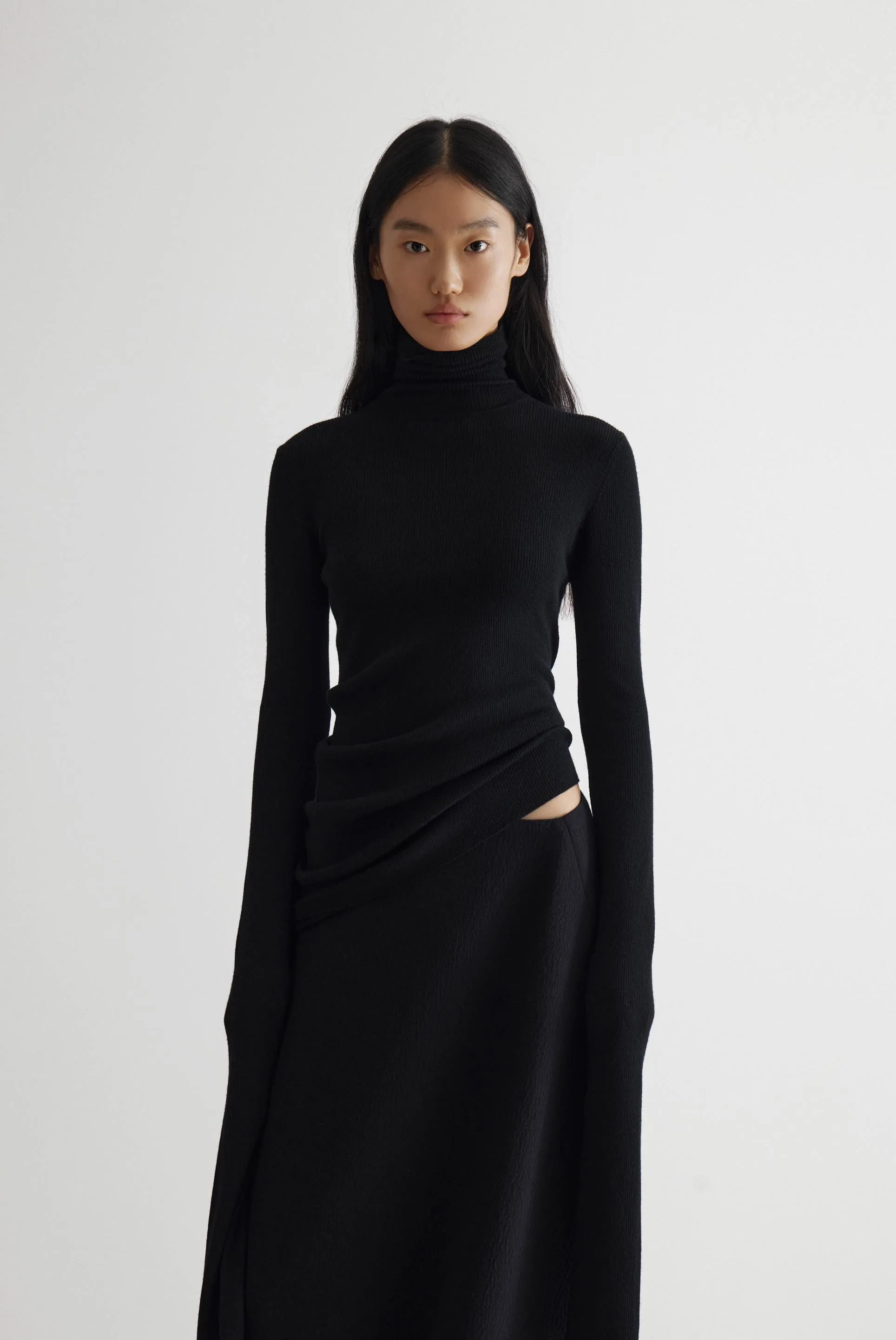 Geometric Curved Turtleneck Wool Knit Top