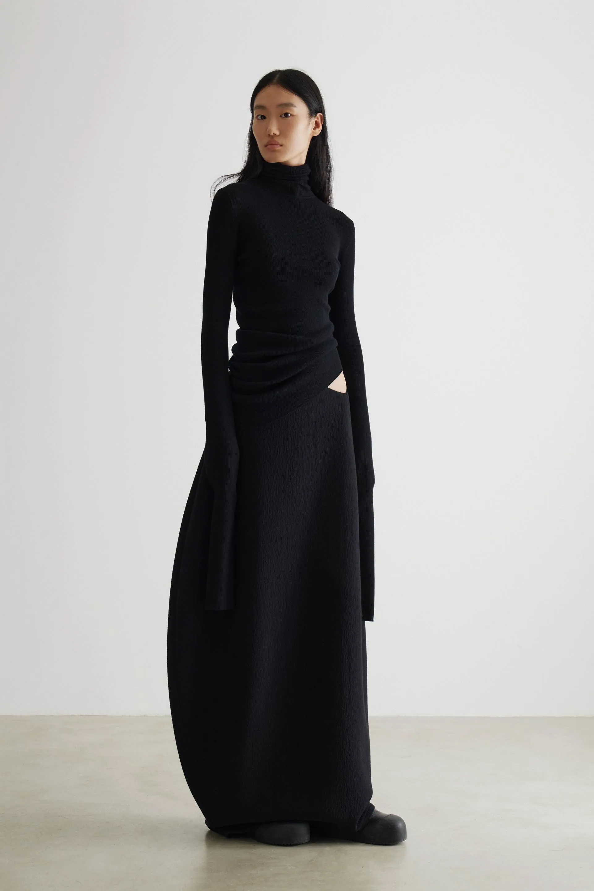 Geometric Curved Turtleneck Wool Knit Top